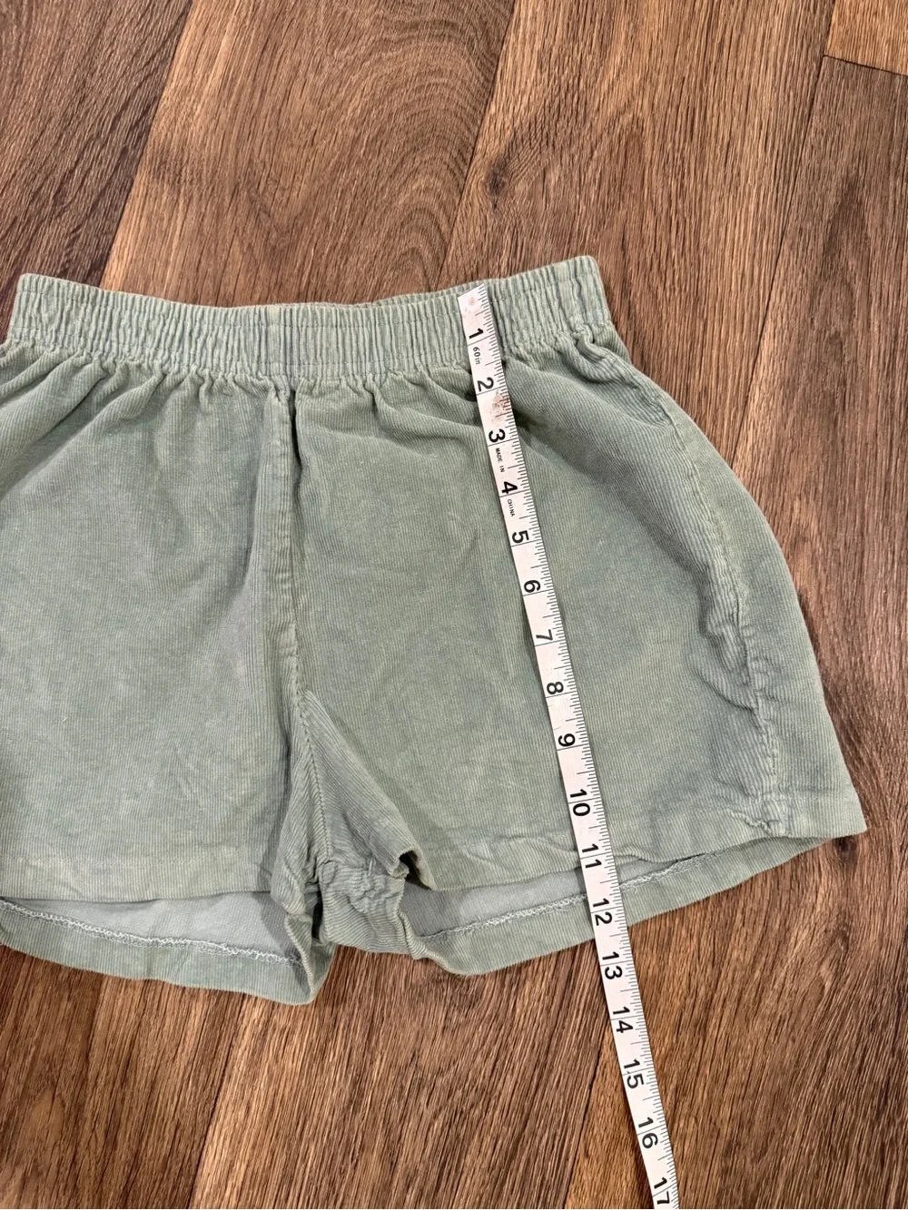 Green corduroy shorts